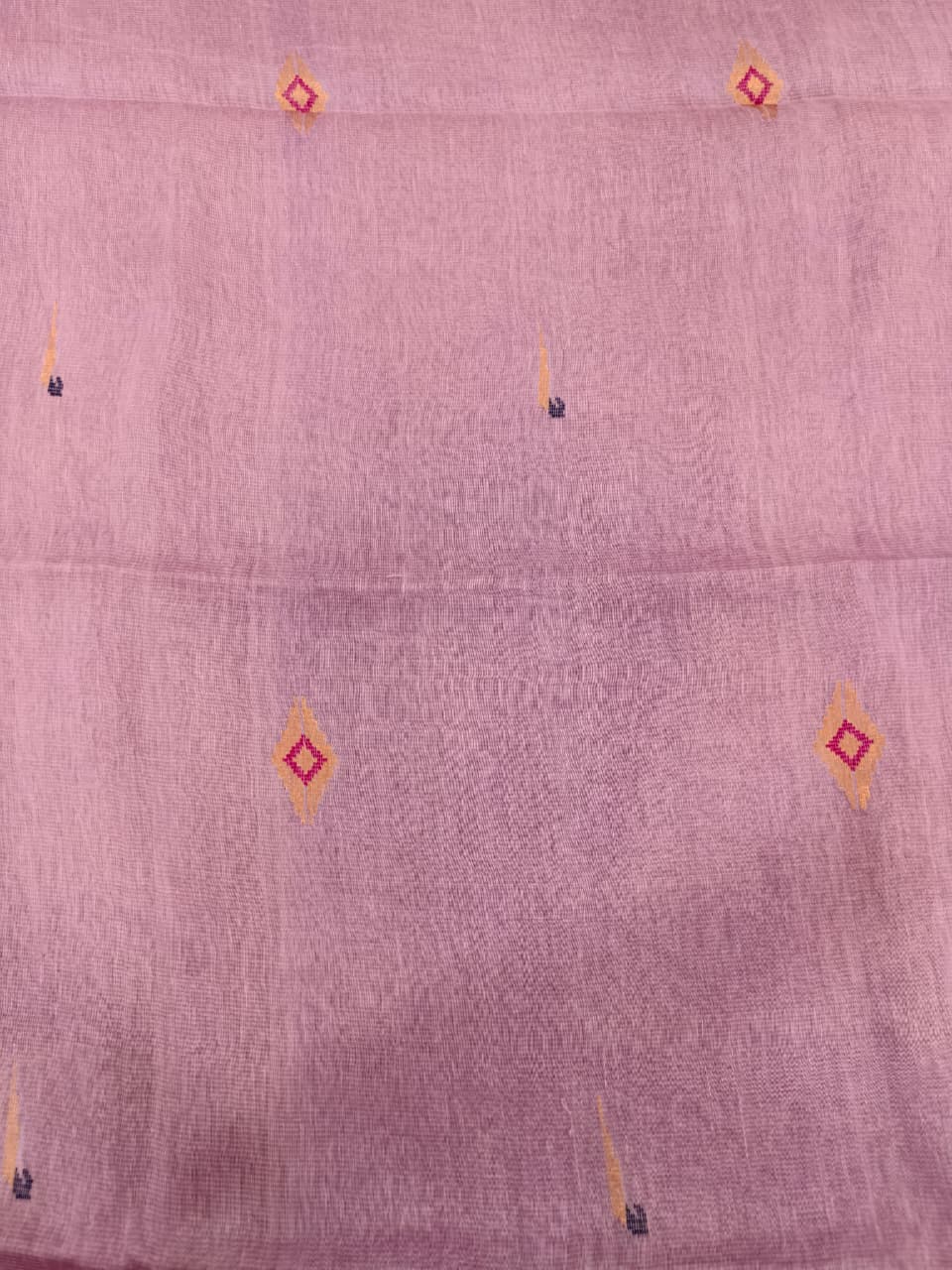 Elegant lavender Tissue Linen Jamdani saree with Paithani-style handwoven parrot motifs and delicate golden zari detailing.