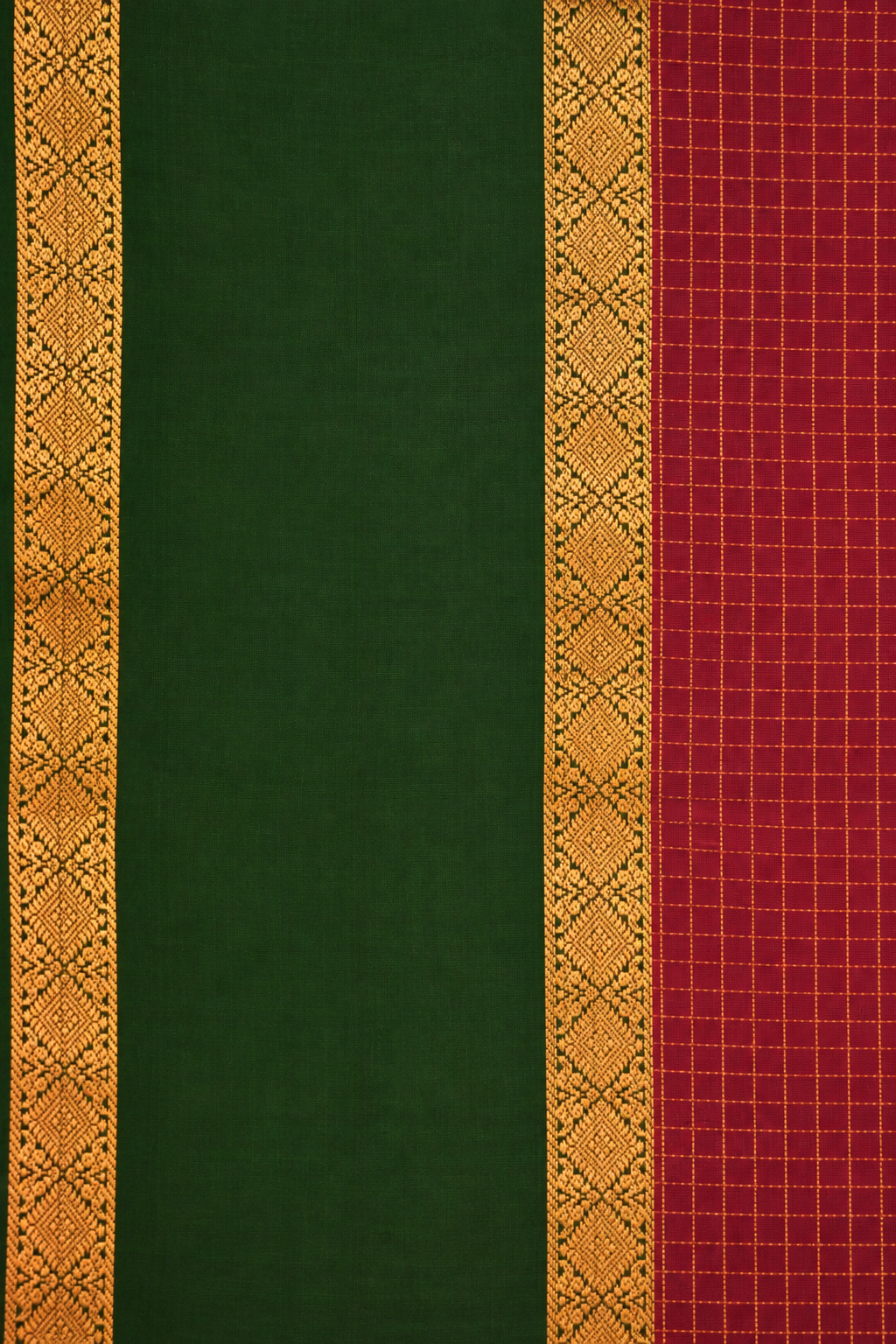 Elegant wine-maroon pure soft silk with a striking dark green border enriched with intricate gold zari diamond motifs.