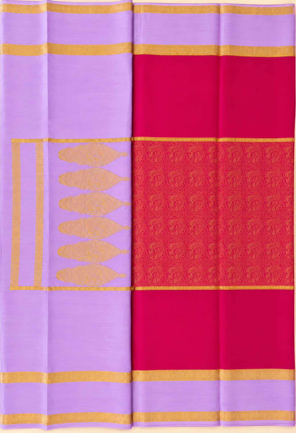 Vibrant Rani Pink Pure Mysore Silk in Mubbagam style, featuring running Peacock zari motifs and an exquisite Leaf-Mango pallu with Peacocks woven within the leaf designs.