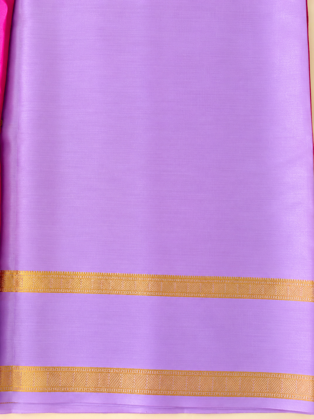 Vibrant Rani Pink Pure Mysore Silk in Mubbagam style, featuring running Peacock zari motifs and an exquisite Leaf-Mango pallu with Peacocks woven within the leaf designs.