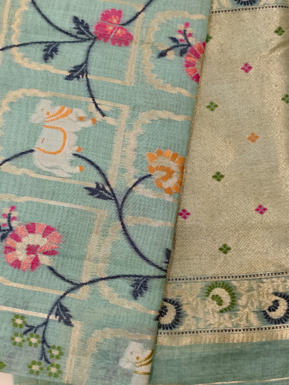 Pastel Blue Linen Jamdani Saree with Floral Motifs & Zari Border