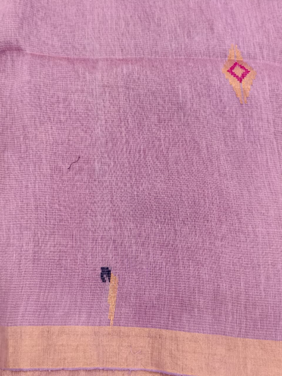 Elegant lavender Tissue Linen Jamdani saree with Paithani-style handwoven parrot motifs and delicate golden zari detailing.