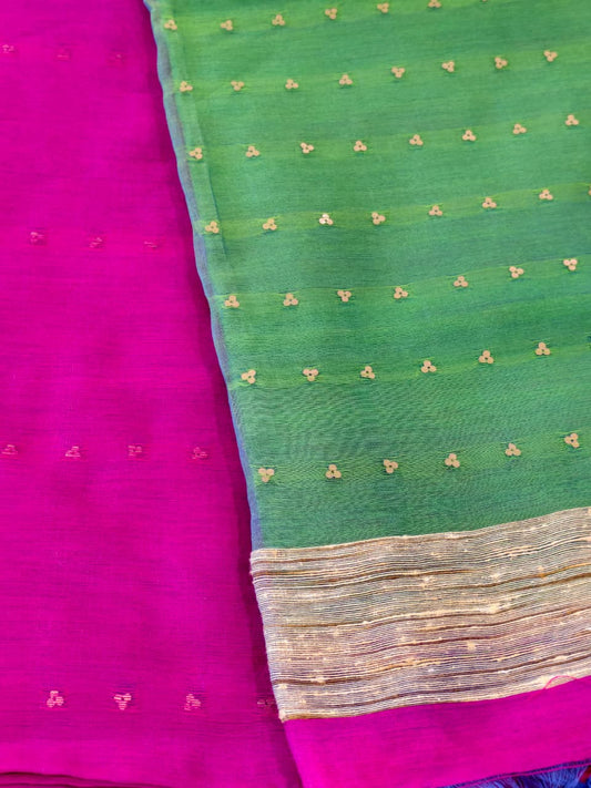 Handwoven Magenta saree with a refreshing Green Muslin pallu, featuring smooth woven coin motifs and a matching Green contrast blouse.