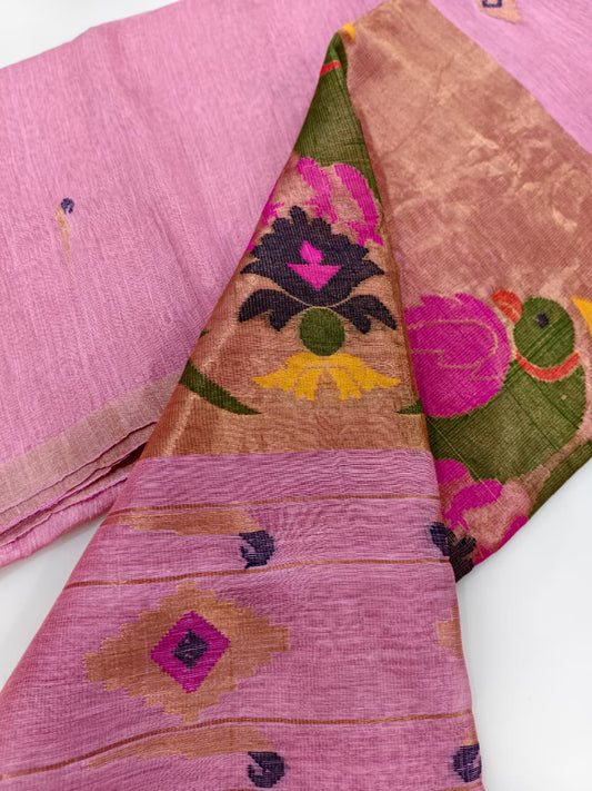 Elegant pastel pink Tissue Linen Jamdani saree with Paithani-style handwoven parrot motifs and delicate golden zari detailing.