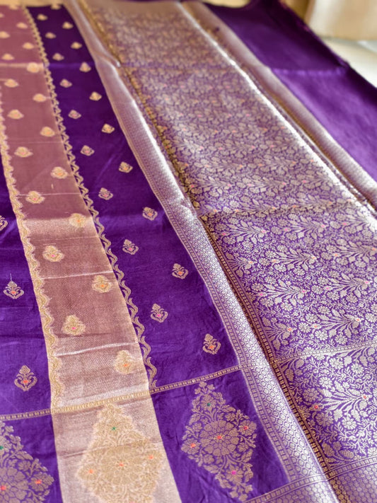 A luxurious Deep Purple Banarasi viscose silk saree featuring intricate all-over Minakari weaving with delicate contrasting accents.