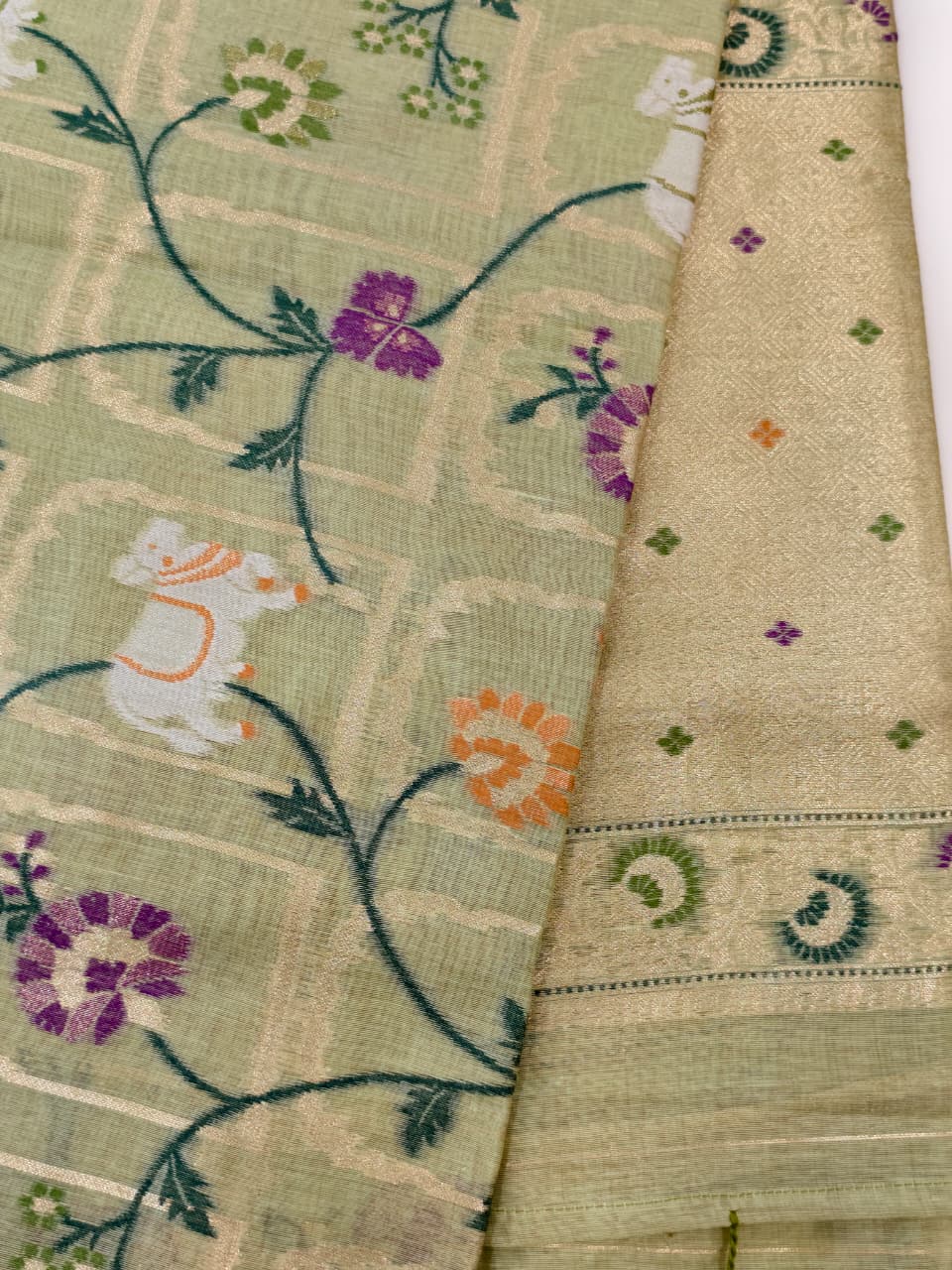 Pastel Green Linen Jamdani Saree with Floral Motifs & Zari Border