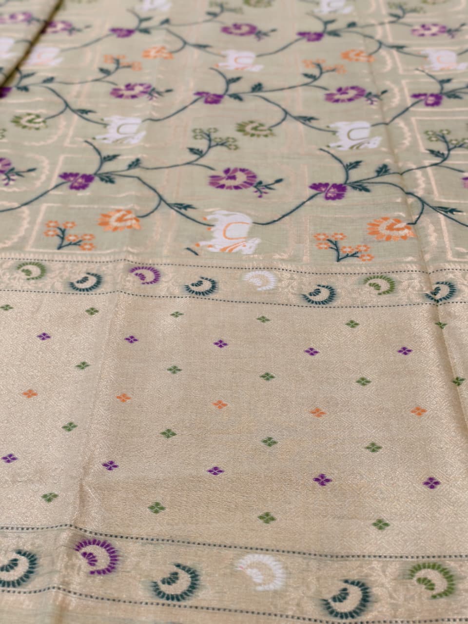 Pastel Green Linen Jamdani Saree with Floral Motifs & Zari Border