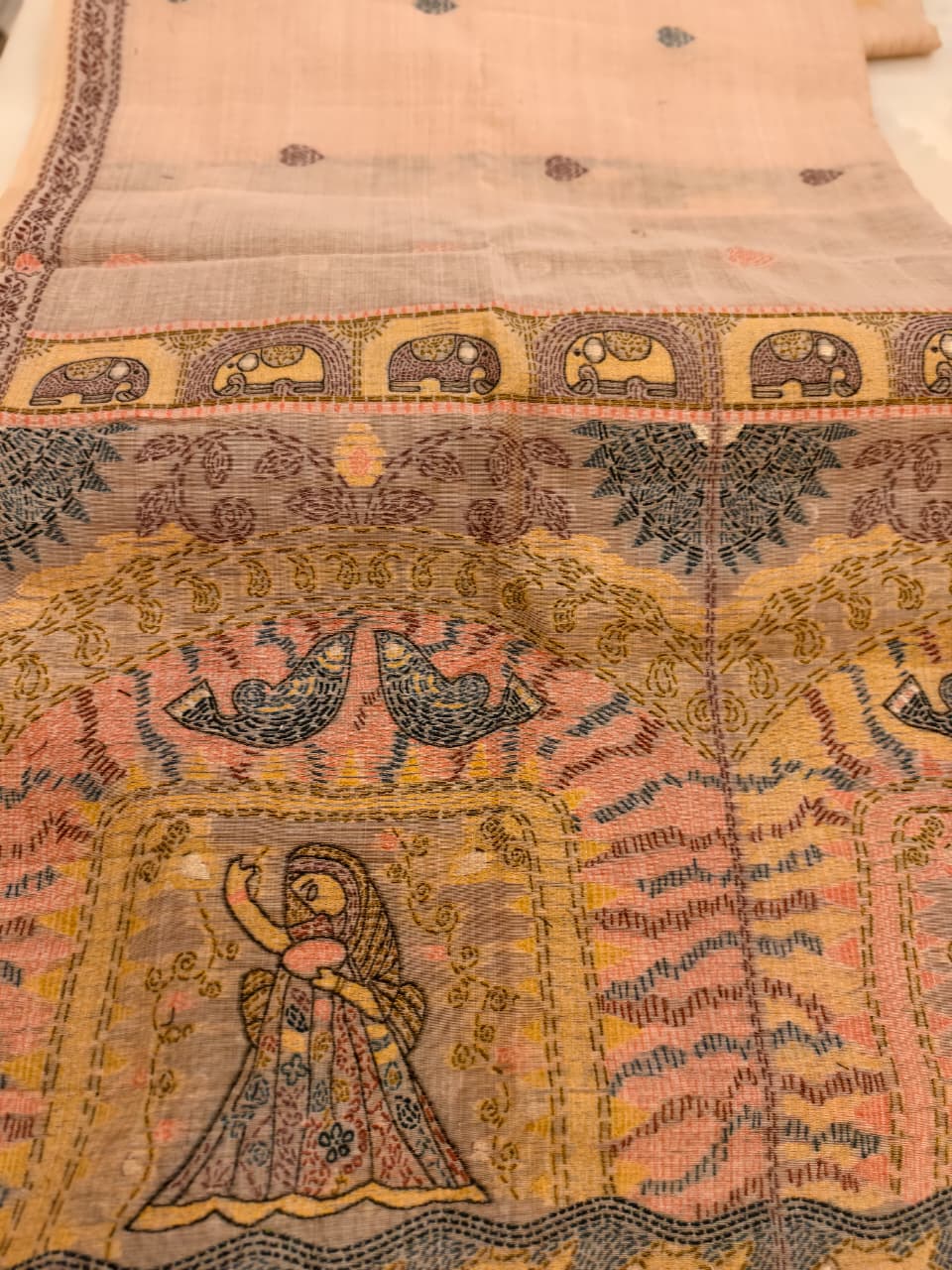 Rose Beige Madhubani inspired village theme woven saree