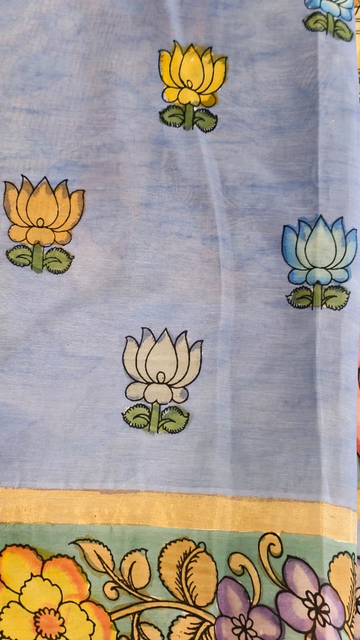 Hand-painted Kalamkari saree in Bangalore Silk featuring Rama & Sita on the body, Krishna & Radha on the pallu, floral borders, and a matching lavendar lotus-motif blouse piece